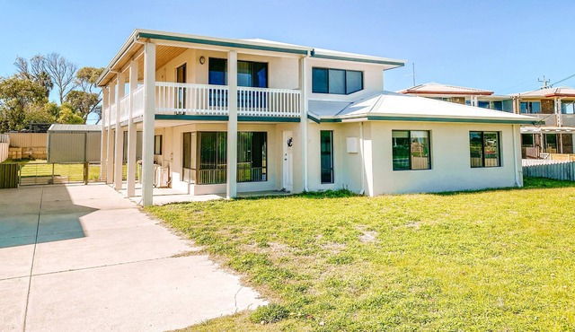 A stunning, spacious and modern two-storey holiday home with ocean views.