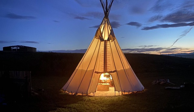 Blackfoot Tipi Lodging under the Prairie Sky. in Chokio