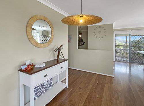 Coastal Upper-Level Home with Shared Pool Access