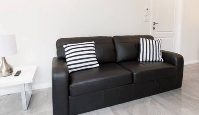 Escape to stylish comfort in this modern apartment!