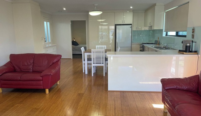 Fully Self contained 1 bedroom spacious unit adjoining rear of owners home.