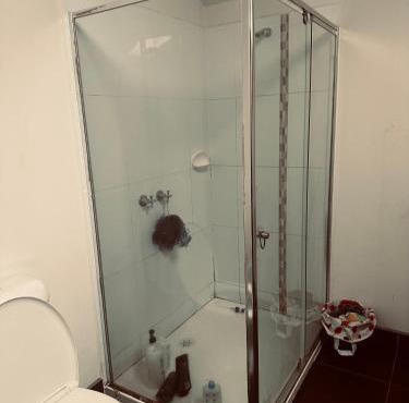 Guest room with private bathroom and living space