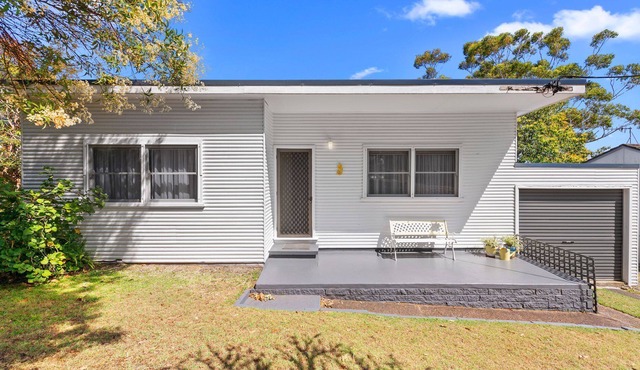 Jen's Place. a charming vintage cottage that embodies the essence of classic coastal living.