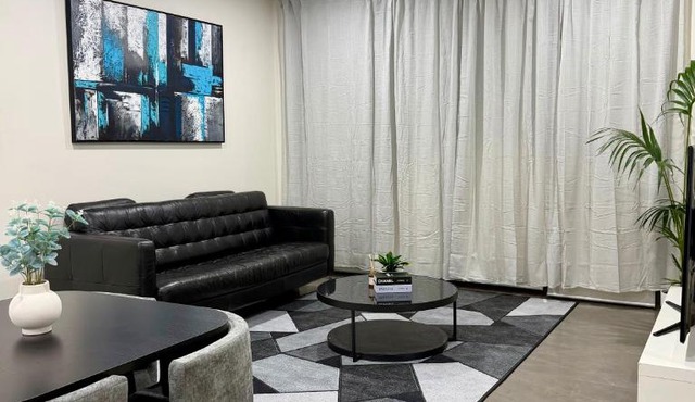 Luxe 3BR Apartment Near Stadium Balcony, Parking & WiFi