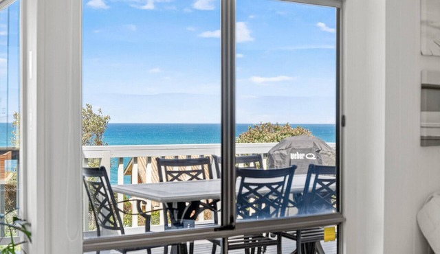 Open the Door to Spectacular Views. Walk to everything. Very Pet Friendly.