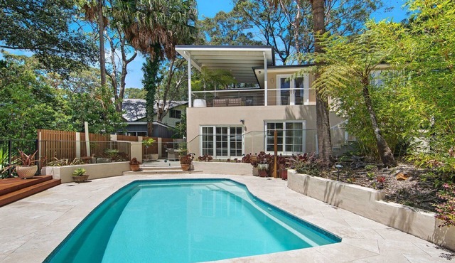 Poolside Retreat by HolidayCo.