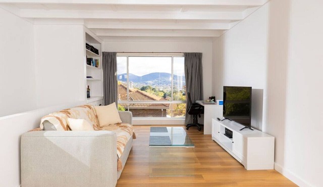 Renovated two-level Sandy Bay apartment