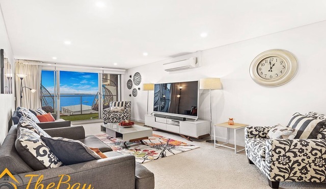 Shoal Bay Apartment one street back from the beach with water views