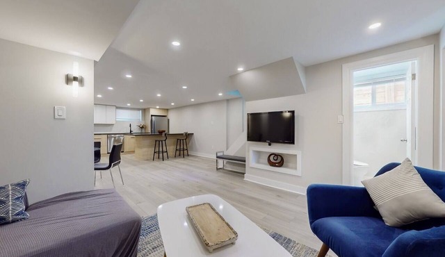 Spacious & Quiet Lower Unit. Mins to Airport/HWY. 2 Parking Spots. Renovated. in Toronto