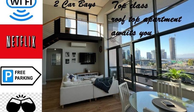 STUNNING! 'New York Style' Roof Top 2 Car Apartment