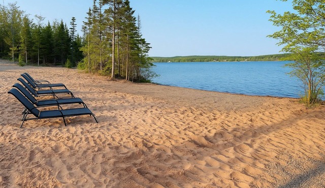 The Luxurious Lakefront Reset on Porters Lake with private beach and hot tub! in Middle Porters Lake