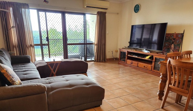 Top Floor Apartment Close to City and Beaches With Sweeping Golf Course Views