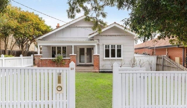 Versatile home in tree lined location