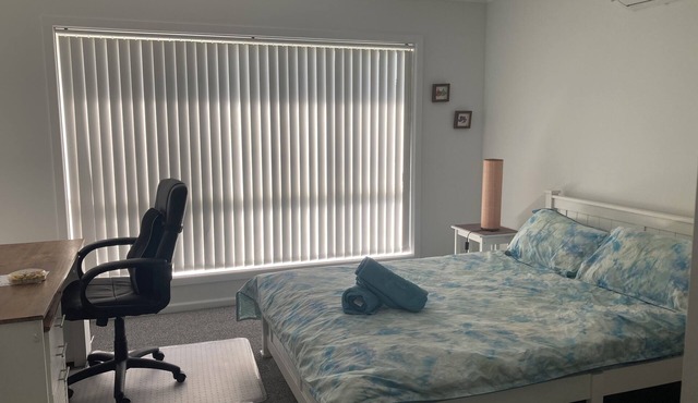 Walk to the beach or river. Family-friendly modern beach house.
