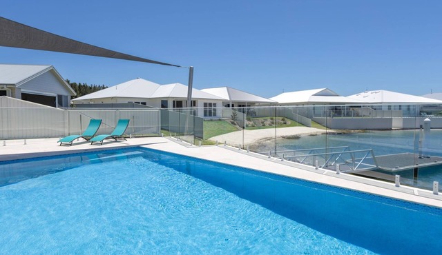 Waterfront. Pool. Boat. Pet-friendly. It doesn’t get better than this.