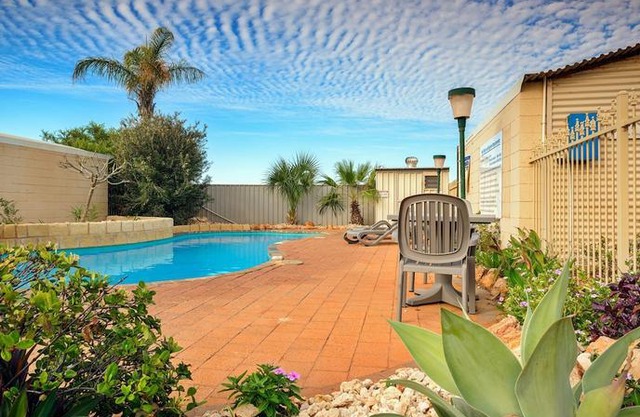 Osprey Holiday Village Unit 120 - Colourful 3 Bedroom Holiday Villa with a Pool in the Complex