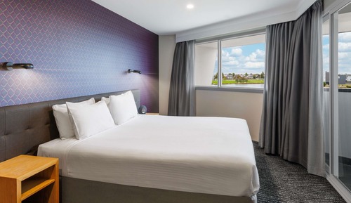Privilege Corner Suite King Bed Room