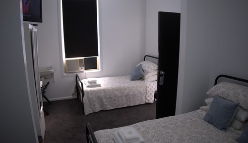 Triple Room, Multiple Beds, Non Smoking, Shared Bathroom