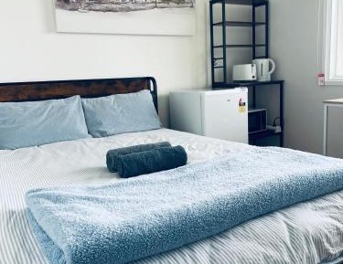 Queen Room with Shared Bathroom