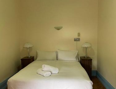 Queen Room with Shared Bathroom