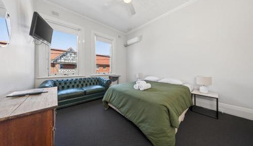 Queen Room with Shared Bathroom