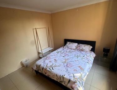 Queen Room with Shared Bathroom