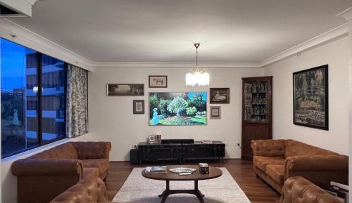 Three-Bedroom Premium Apartment with Balcony