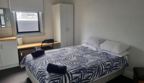 Queen Room with Shared Bathroom