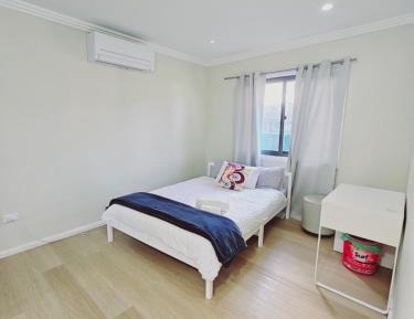 Queen Room with Shared Bathroom