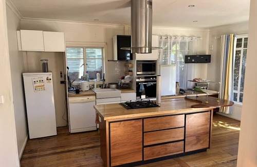 Frankston House | One master bedroom with own bathroom, the other one a bedroom with shared bath.