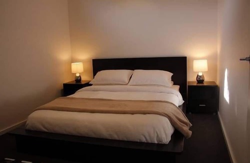 Somers Apartment | Somers Holiday accommodation with stunning balcony seaviews and private garden