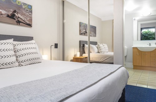 Mermaid Beach Apartment | 2-Bed Family Haven with Pools, BBQ & Playgrounds