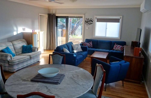 Culburra Beach House | 4BR Holiday Home with wheelchair access, Covered Deck, Pet-Friendly Yard
