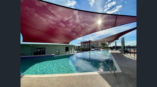 Parap Apartment | Luxury Parap Retreat with Pool and Gym