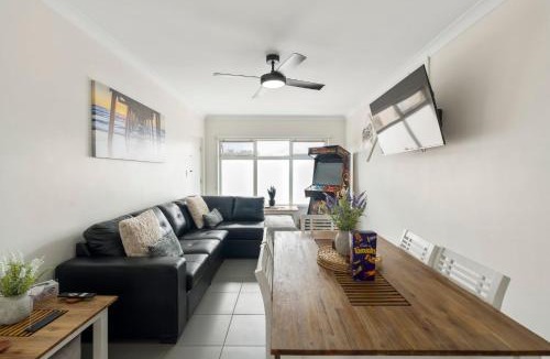 West Beach Apartment | Stylish Seaside Suite with Arcade and Balcony