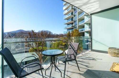 City East Apartment | Modern City Stay with Scenic Parkland Views - Hosted by Canstay