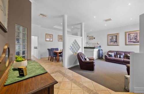 Secret Harbour House | Coastal Retreat with Pool Alfresco & Family Comfo