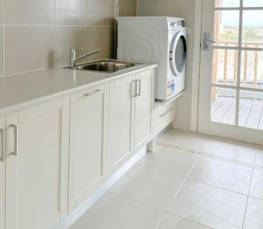 Kilcunda House | Coastal Sanctuary, Spa, EV friendly, Pet Firendly with Fireplace, wood provided Just 50m to Kilcunda Beach and 100m to the Ocean View Hotel The Sticks and Copper Door Kitchen Accessibility Friendly