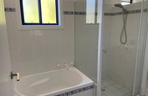 Corlette Apartment | Copacabana 4 61 Sandy Point Rd - water views, air con and WiFi