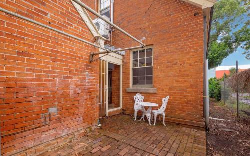 Grafton Apartment | Eliza 1875 Red Brick Duplex Townhouse